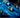 Shapes of Love diamond necklace displayed on large diamond pieces with a blue background.